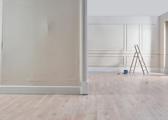 Man,Home,Renovation,,Paint,Whitewash,,Repairing,And,Wall,Concept,,Home